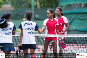 Ladies College 2nd Doubles players shake hands with the Visakha