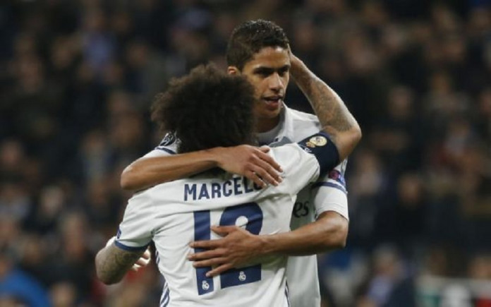 Real Madrid's Marcelo and Raphael Varane