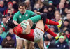Mixed feelings for Irish after Wales draw Wales' wing Tom James (C) is tackled by Ireland's wing Keith Earls during the Six Nations international rugby union match between Ireland and Wales at the Aviva Stadium in Dublin, Ireland, on February 7, 2016. / AFP / PAUL FAITH