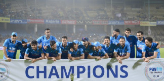 Indian cricket team pose with paytm T20 champions Trophy during the third T20 international match between India and Sri Lanka at the Dr. Y.S. Rajasekhara Reddy ACA-VDCA Cricket Stadium in Visakhapatnam on February 14, 2016. India won the series with 2-1. / AFP / NOAH SEELAM