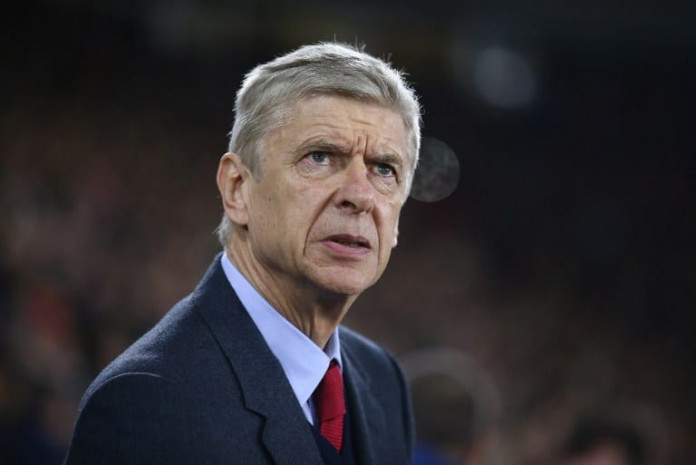 Arsenal's French manager Arsene Wenger looks on ahead of the English Premier League football match between Southampton and Arsenal at St Mary's Stadium in Southampton, southern England on December 26, 2015. AFP PHOTO / JUSTIN TALLIS