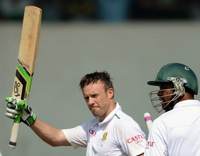 South Africa's AB de Villiers celebrates after scoring a century (100 runs) on the final day of a two-day cricket match between an Indian Board President's XI and South Africa