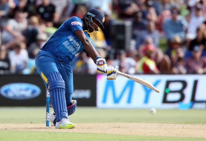Thisara Perera of Sri Lanka plays a shot during the first Twenty20 cricket match between New Zealand and Sri Lanka at the Bay Oval in Mount Maunganui on January 7, 2016. AFP PHOTO / MICHAEL BRADLEY / AFP / MICHAEL BRADLEY