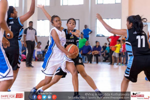 Hazeena Abdul through the defense for a layup.