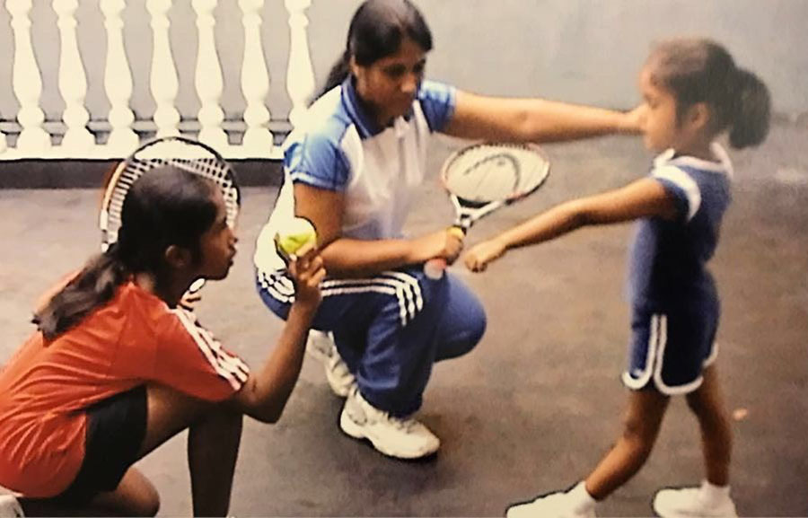 Sister Yasodara and mother Gothami seen here molding Adithya’s forehand