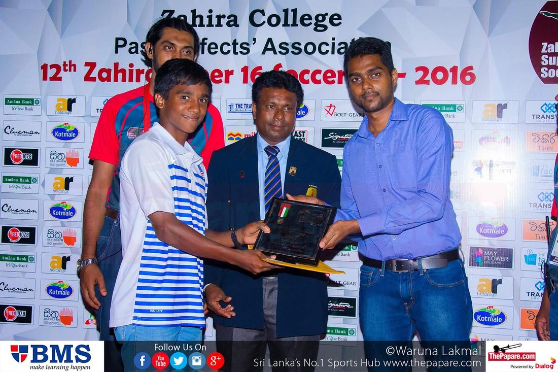 12th Zahira Super 16 Soccer 7's 2016 - Zahira College Grounds - 08/10/2016 Maris Stella captain Anjana Gunawardena collects the Shield championship trophy.