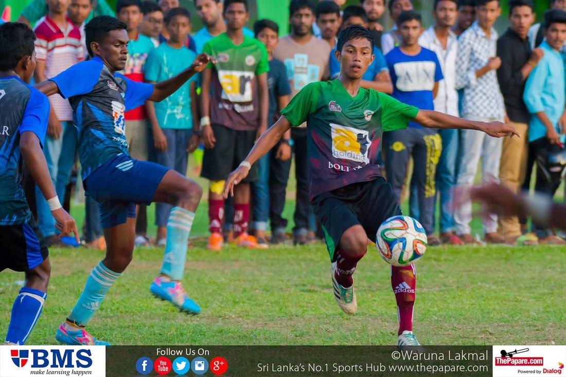 12th Zahira Super 16 Soccer 7's 2016 - Zahira College Grounds - 08/10/2016 Shafran Sathar (R) about to take a shot while Weslyan defender (L) tries to block it.