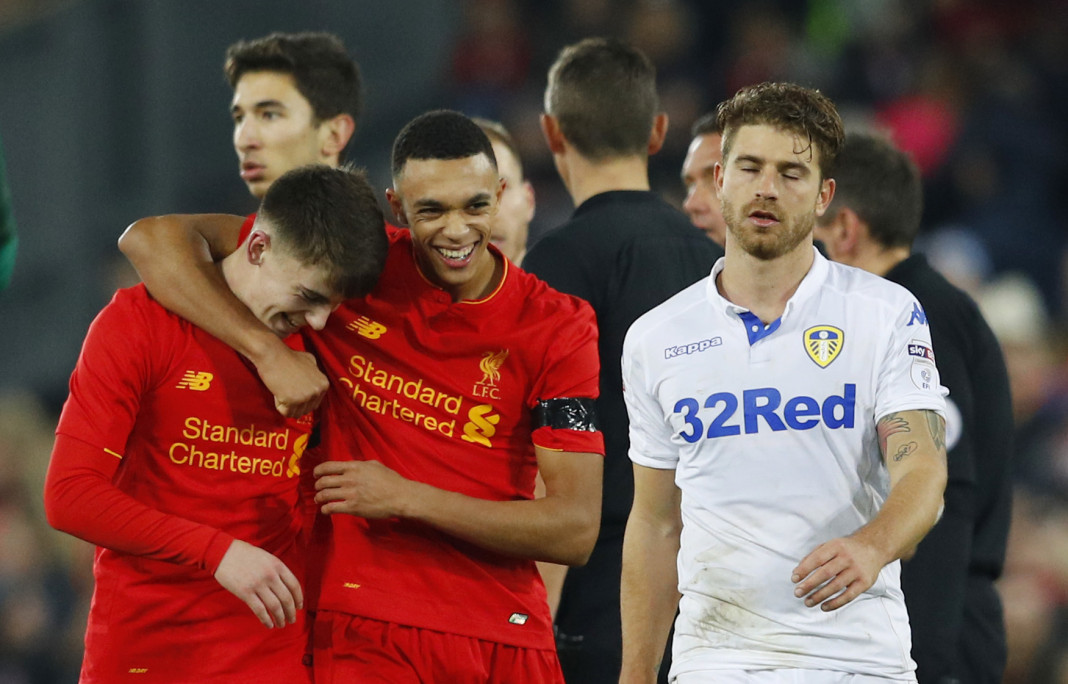 Record-breaker Woodburn helps Liverpool reach League Cup semis