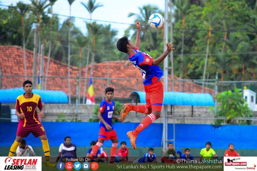 Maris Stella College v Wickramabahu College - U19 Schools Football Division I 2016 - Maris Stella Grounds, Negombo - 03/11/2016 Maris defender claims a high ball.