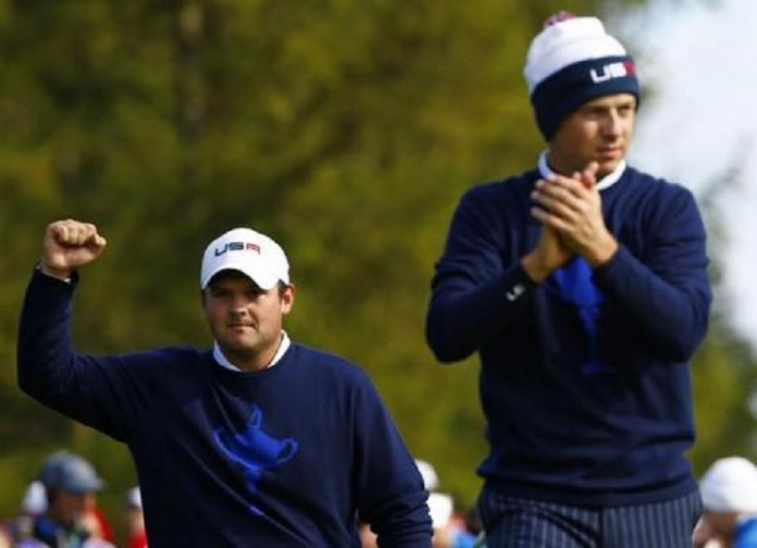 U.S. Ryder Cup players Patrick Reed and Jordan Speith celebrate winning their fourballs 40th Ryder Cup match at Gleneagles