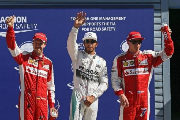 Mercedes Formula One driver Hamilton of Britain celebrates after getting the pole position at the end of the qualifying session for the Italian F1 Grand Prix in Monza