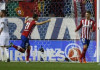 Atletico’s Vietto strikes late in draw with Real