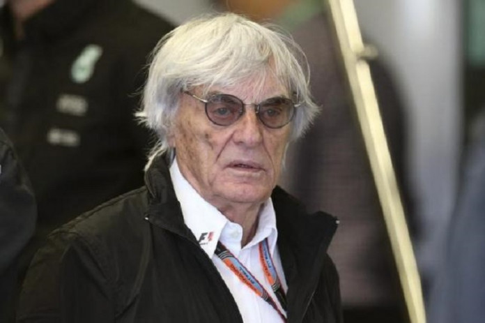 Formula One supremo Bernie Ecclestone walks in the Mercedes team garage during the third practice session of the Canadian F1 Grand Prix in Montreal
