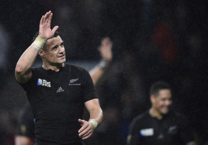 New Zealand's fly half Dan Carter celebrates after winning a semi-final match of the 2015 Rugby World Cup between South Africa and New Zealand at Twickenham Stadium