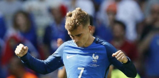 Griezmann double sends France into Euro 2016 last eight