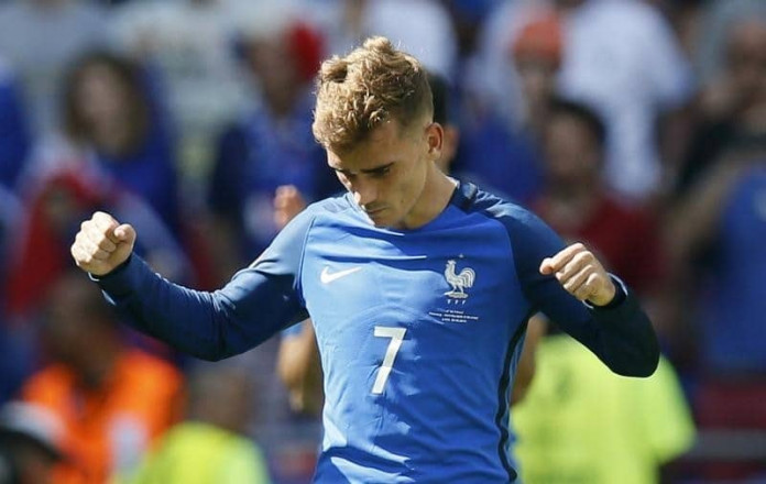 Griezmann double sends France into Euro 2016 last eight