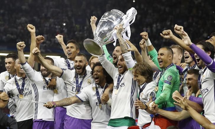 Real Madrid's Sergio Ramos celebrates with the trophy after winning the UEFA Champions League Final