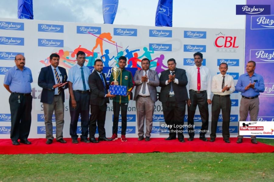 Aruna Liyanapathirana, Category Manager – Ritzbury, presents Best Athlete of the Year – Boys   award to A. Romexson Lambert from St. Anne’s College - Vankalai