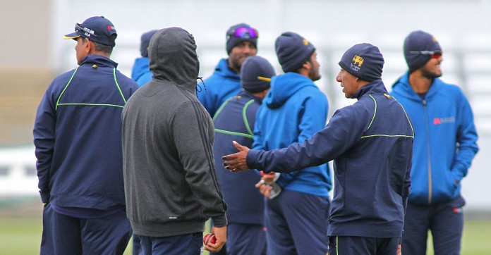 CHESTER-LE-STREET, ENGLAND - MAY 25: Players and coaching staff keep warm during Sri Lanka Nets session ahead of the 2nd Investec Test match between England and Sri Lanka at Emirates Durham ICG on May 25, 2016 in Chester-le-Street, United Kingdom. (Photo by Mitchell Gunn/Getty Images) *** Local Caption ***