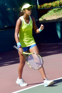 Adithya Karunaratne celebrating at the SLTA courts during an ITF even