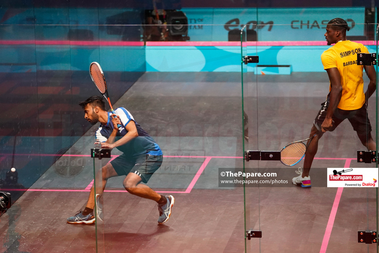 Shamil Wakeel competes in the Squash Men's Singles encounter against Shawn Simpson of Barbados at the University of Birmingham Squash Courts during the Birmingham 2022 Commonwealth Games.