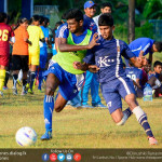 A Kingswood and a Josephian player tussling for the ball