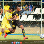 Bodrie Dimitri (R) tussling for the ball with Suntharaj Niresh (L) in the City FL President's Trophy