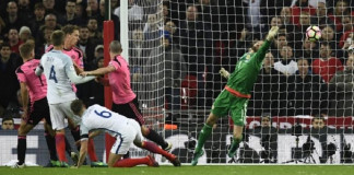 England's Gary Cahill scores their third goal