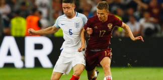 Late Russia goal snatches 1-1 draw against England