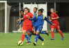 Sri Lanka Women wins two friendlies ahead of SAG Goalscorer Praveen Maduki dribbles past a Singapore player (Photo - Football Association of Singapore)