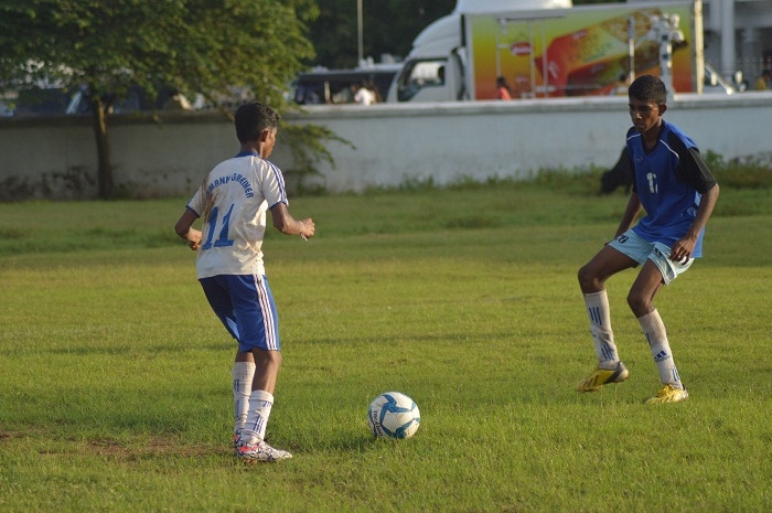 Herman Gmeiner player (L) against a S.Thomas' player (R) - Schools Football 2016 (Pic Credit - Amhar Ahmed)