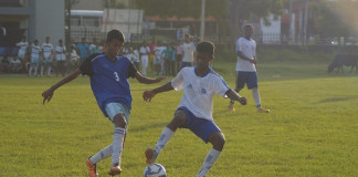 Herman Gmeiner player (R) and a S.Thomas' player (L) tussling for the ball - Schools Football 2016 (Pic Credit - Amhar Ahmed)