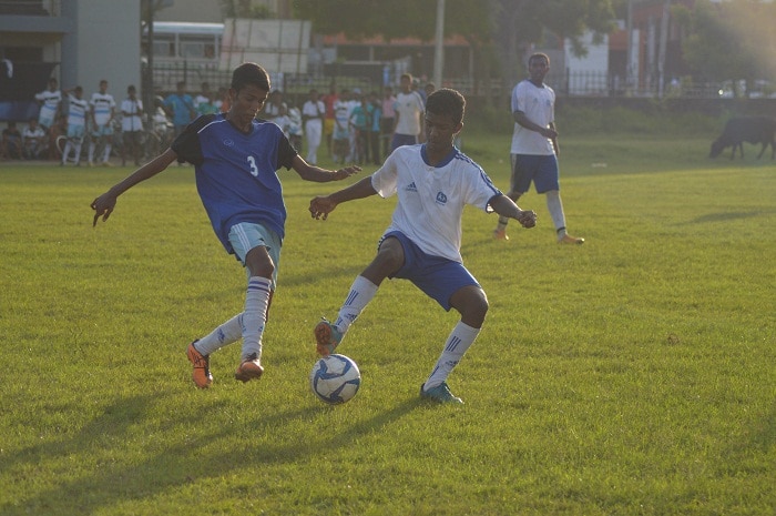 Herman Gmeiner player (R) and a S.Thomas' player (L) tussling for the ball - Schools Football 2016 (Pic Credit - Amhar Ahmed)