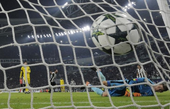 Juventus' Gonzalo Higuain scores their first goal