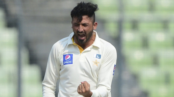 Pakistan cricketer Junaid Khan reacts after the dismissal of the Bangladesh cricketer Tamim Iqbal during the second day of the second cricket Test match between Bangladesh and Pakistan at the Sher-e-Bangla National Cricket Stadium in Dhaka on May 7, 2015. AFP PHOTO/ Munir uz ZAMAN (Photo credit should read MUNIR UZ ZAMAN/AFP/Getty Images)