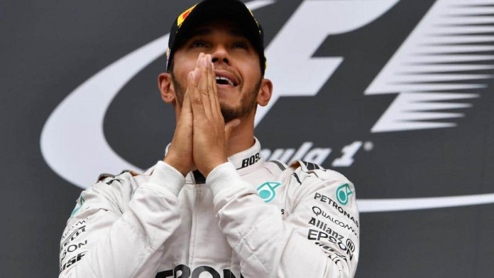 Hamilton survives Rosberg battering to win