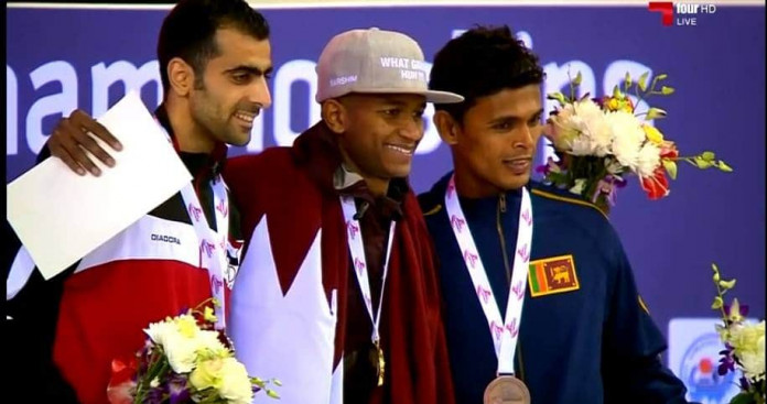Manjula Kumara (R) on the winners podium - 7th Asian Indoor Athletics Championships.
