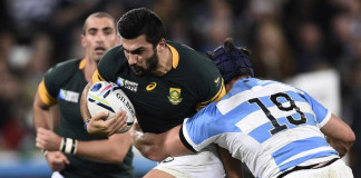 South Africa's centre Damian de Allende (C) is tackled by Argentina's lock Guido Petti Pagadizabal during the bronze medal match of the 2015 Rugby World Cup between South Africa and Argentina at the Olympic Stadium, east London, on October 30, 2015.