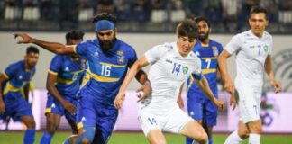 Sri Lanka’s Chamod Dilshan (L) & Uzbekistan’s captain Eldor Shomurodov (R) tussling for the ball in their AFC Asian Cup qualifiers 2023 – 3rd Round match