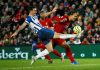 Van Dijk nets double as Liverpool surge 11 points clear