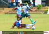 அரையிறுதிக்குள் புனித ஹென்றிக் கல்லூரி St.Henry's player goes past a tackle