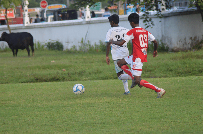 St.Sebastian's and St.Thomas' College, Matara player tussling for the ball - Schools Football 2016