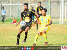 Tuan Rizni (L) in control of the ball against Saunders SC in the City FL President's Trophy