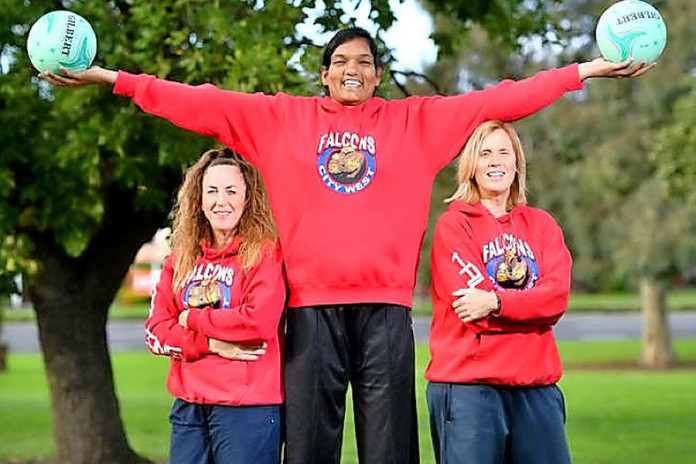 Tharjini Sivalingam (centre) with City West Falcons coach Marg Lind and Nicole Richardson. Picture Damjan Janevski