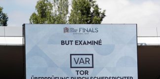 The big screen confirms a VAR review