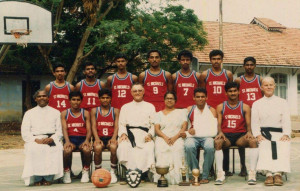 Rev.Fr. Eugene Herbert SJ with the St. Michael’s College Basketball Team