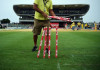 Weather wreaks havoc on Tri-Nation cricket A man collects the stumps from the field after rain interrupted at the Kensington Oval stadium in Bridgetown