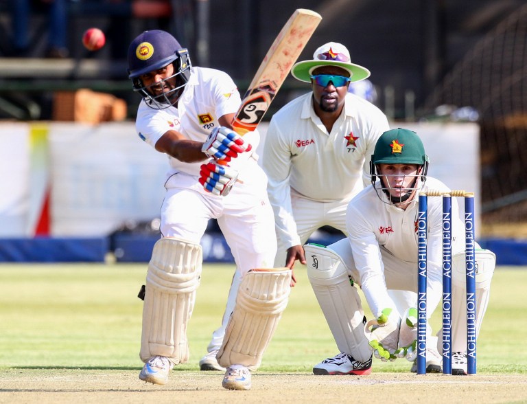 ශ්‍රී ලංකාව සහ සිම්බාබ්වේ අතර පැවැති ප්‍රථම ටෙස්ට් තරගයේ පළමු දිනයේදී ශ්‍රී ලංකා පිතිකරු කෞෂාල් සිල්වා පන්දුවට පහර දෙමින් ©AFP