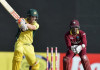 Warner half century as Australia thrash Windies