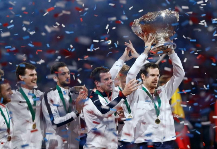 Great Britain's Andy Murray celebrates with the trophy after winning the Davis Cup